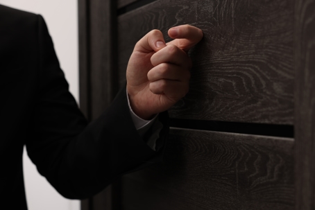 Collector knocking on door