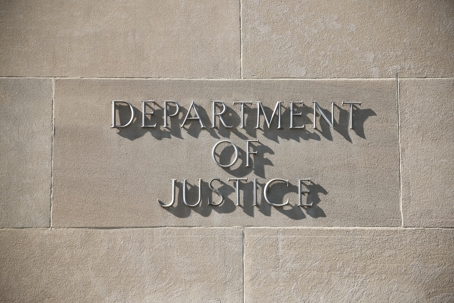 United States Department of Justice building sign in Washington D.C.