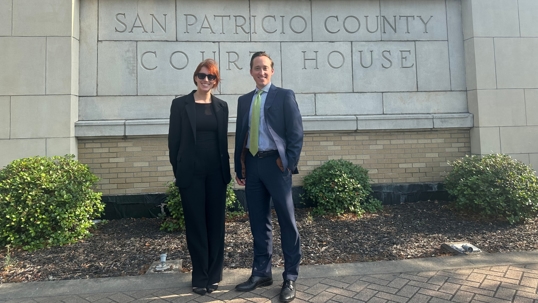 Ray Panneton and Katy Penick in front of the San Patricio County Court House