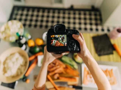 Influencer taking photo of food