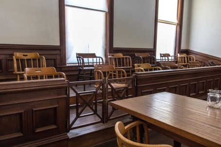 Empty jury seats in courtroom due to COVID-19.