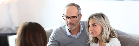 Couple meeting with lawyer to discuss a Special Needs Trust.