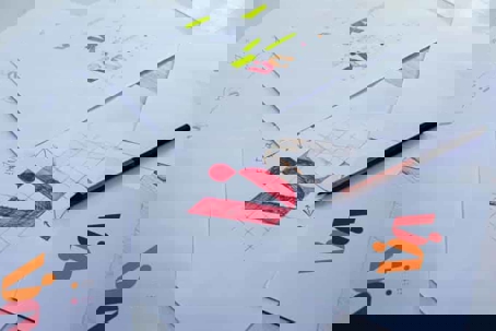 Sketches and drawings of a logo design