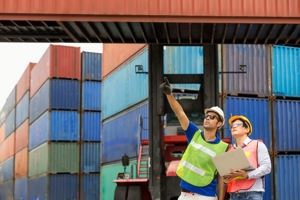 Two foreman discussing plans on job site