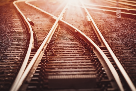 View of a railroad track diverging in different directions.