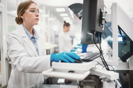 A laboratory technician conducts a series of tests in a medical testing laboratory.