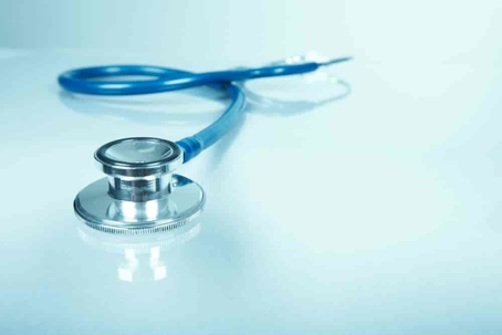 A stethoscope on a white countertop.
