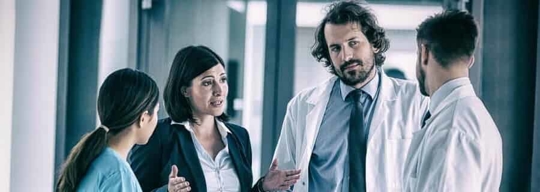 Physicians in group practice discussing Stark Law