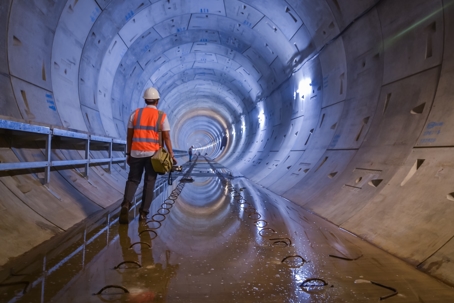 Person standing in tunnel